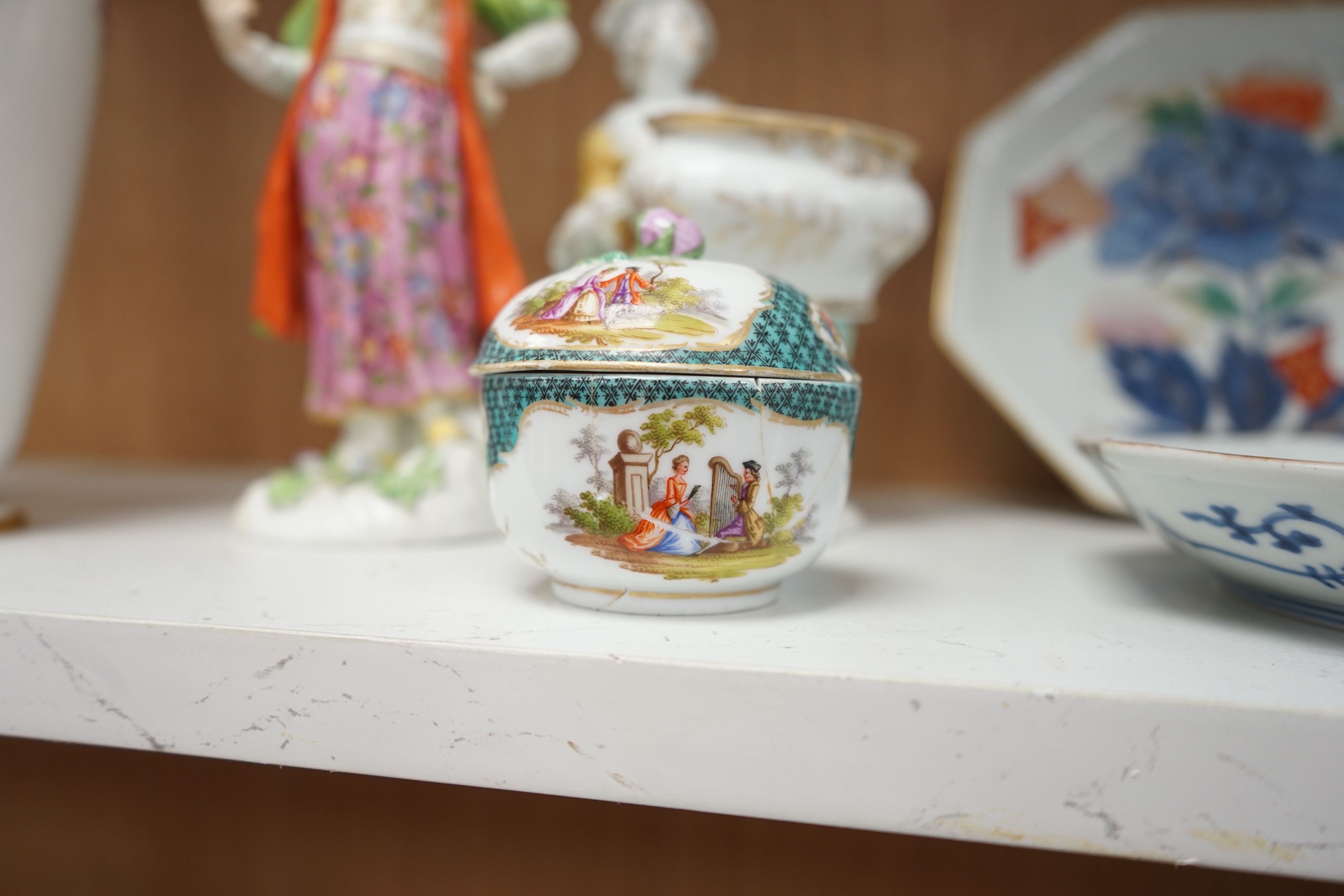 A group of various ceramics to include a Berlin floral decorated vase, a pair of Meissen dishes, similar box and cover, figural sweetmeat and figure of a Turk, together with a pair of Japanese Imari dishes, tallest 33cm.